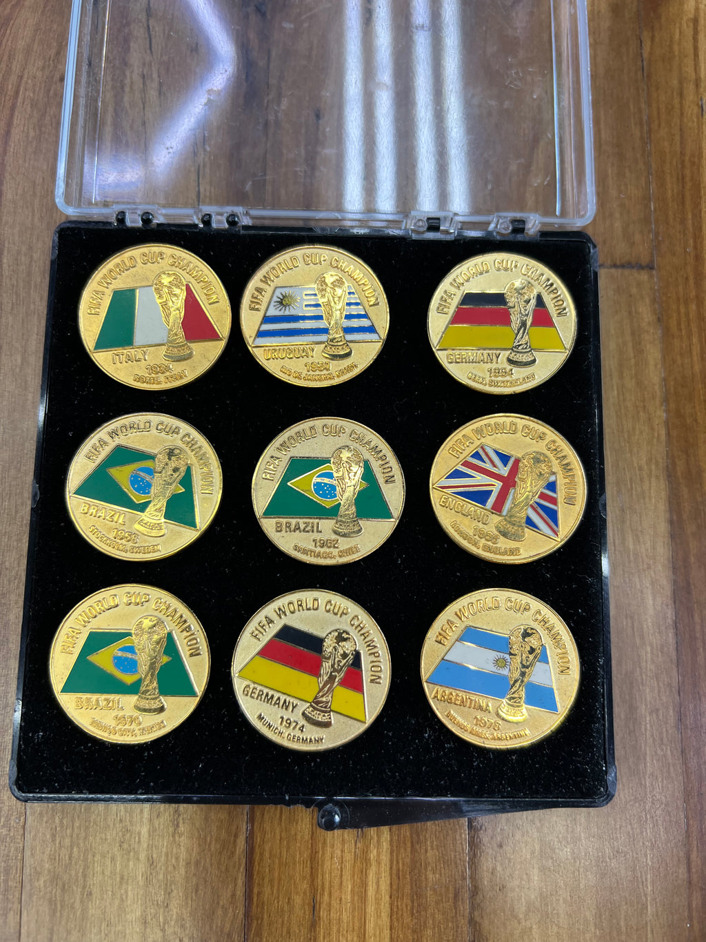FIFA World Cup Champions Collector Pin Set (1930–1978) – Vintage Gold-Tone Enamel Pins in Display Case