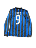 Blue and black striped sports jersey with number 9 and 'Etoño' text on a white background