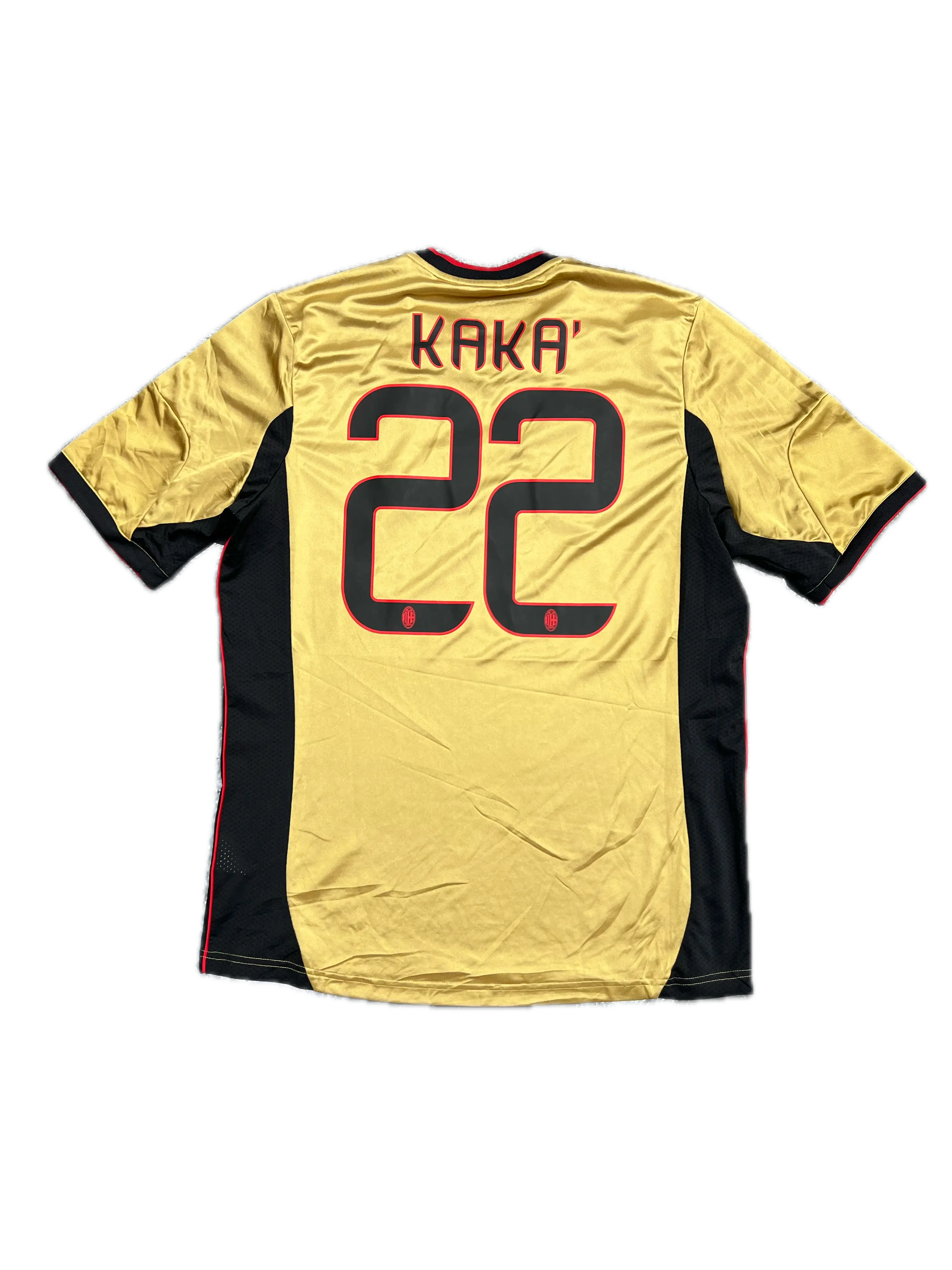 Yellow sports jersey with black and red details, featuring the number 22 and the name 'Kaka'.