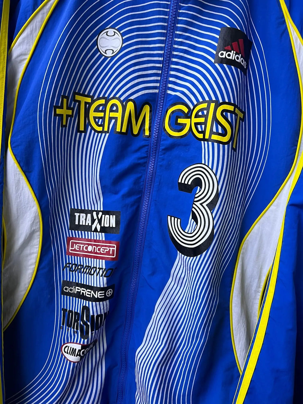 adidas Originals 2025 Teamgeist Moto Track Jacket – Blue/Yellow — detail