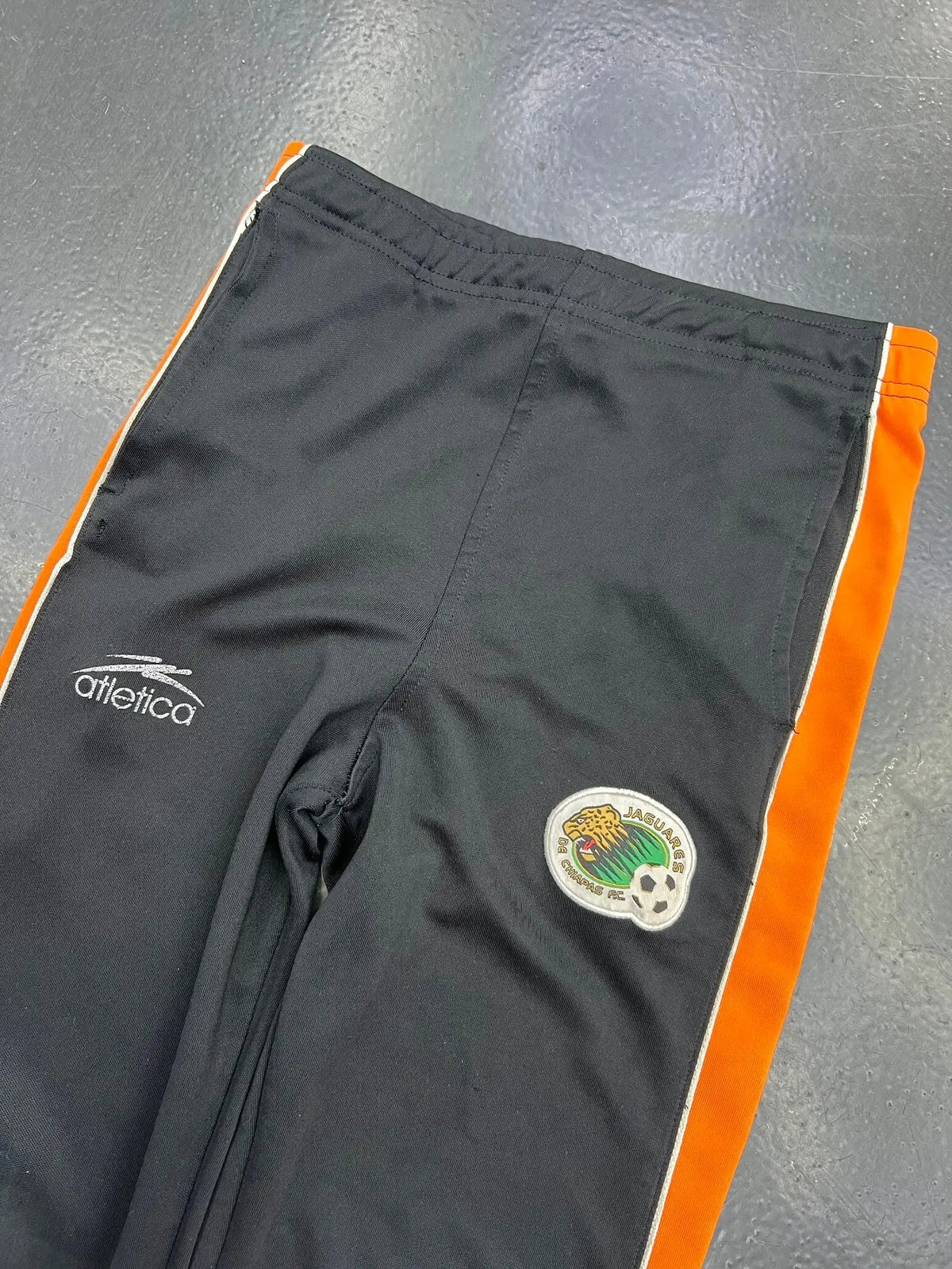 Atlética Jaguares de Chiapas Track Pants – Black/Orange — detail