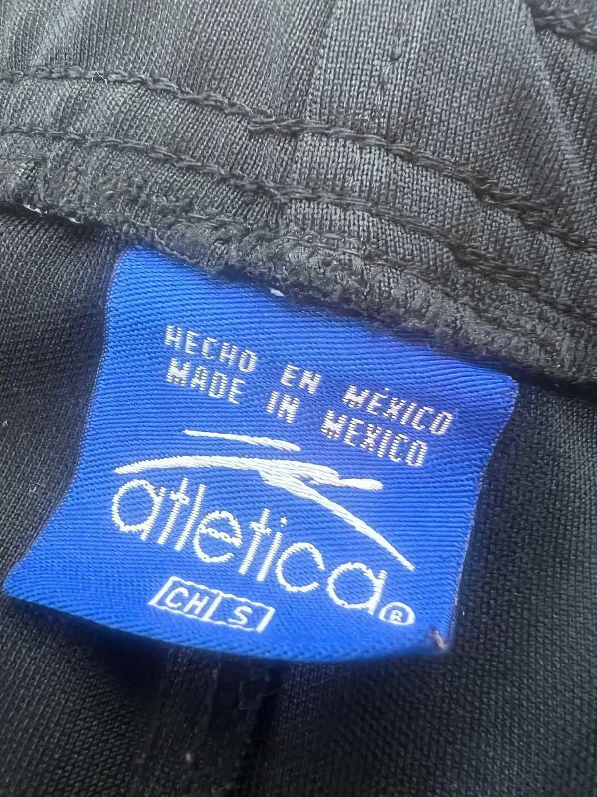 Atlética Jaguares de Chiapas Track Pants – Black/Orange — label