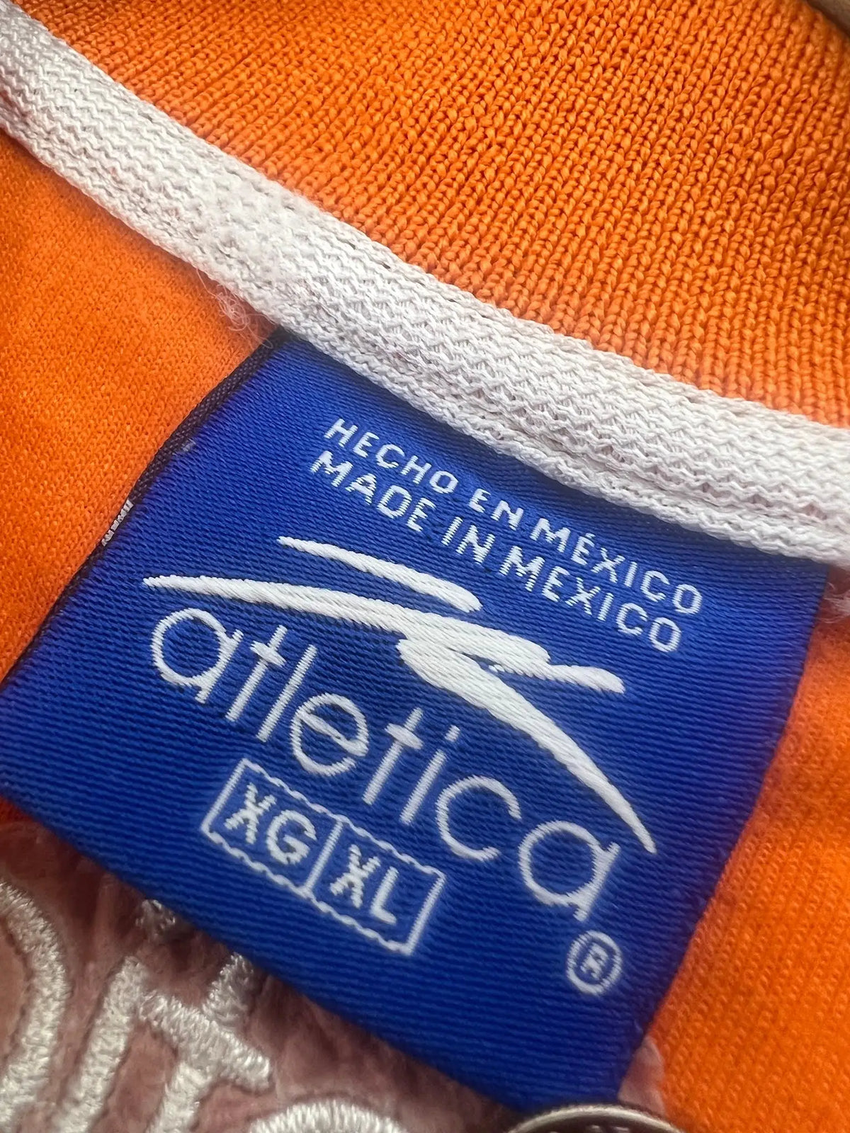 Atlética Jaguares de Chiapas Polo – Orange — label