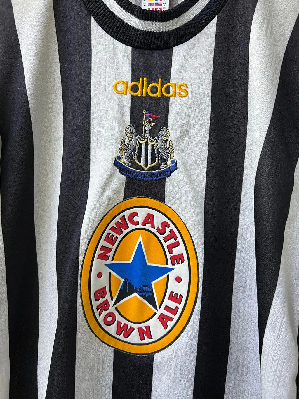 Adidas Newcastle United 1997–99 Home Jersey – Alan Shearer #9 — chest sponsor close-up