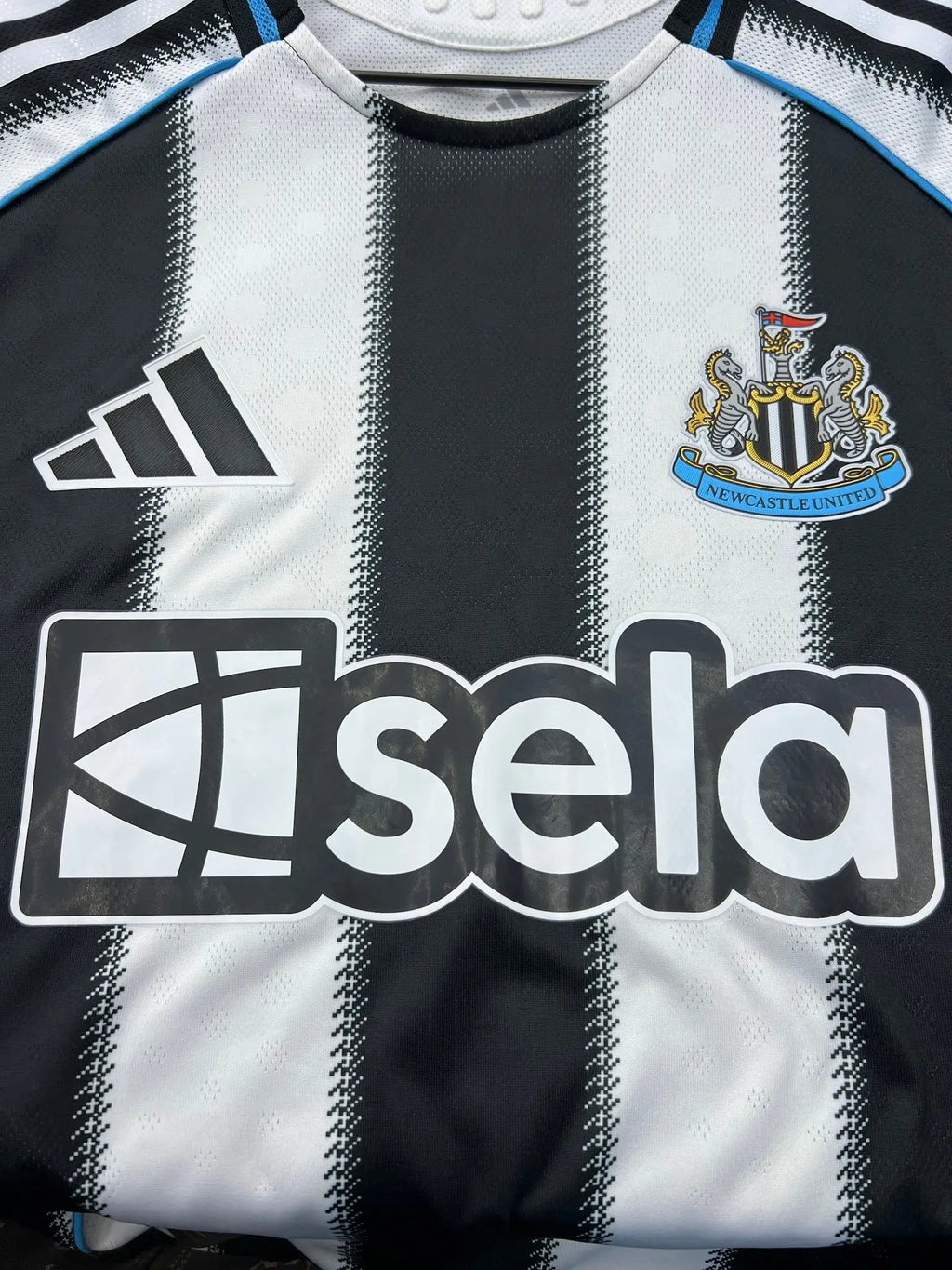 Adidas Newcastle United 2025/26 Authentic Home Jersey — chest sponsor close-up