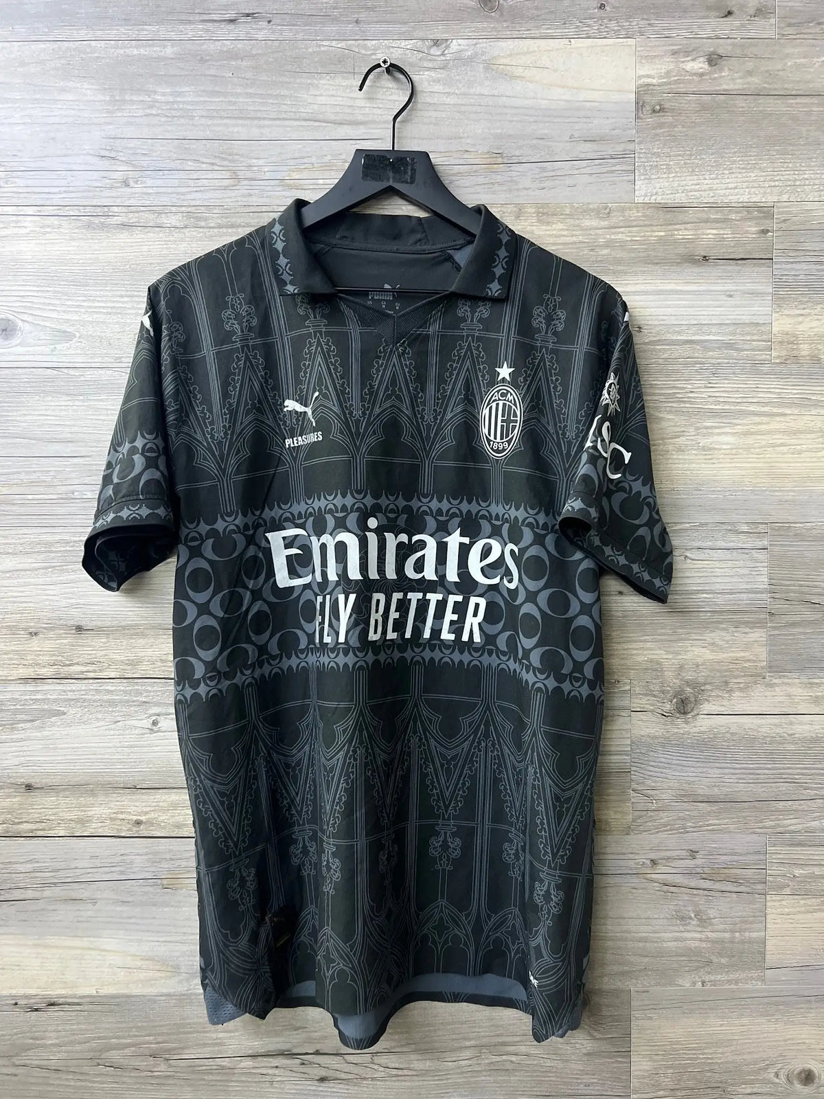 Puma x PLEASURES AC Milan 2023/24 Fourth Jersey – Theo Hernández #19 — front view